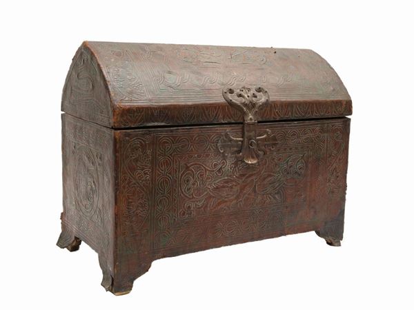 Wooden casket covered in embossed leather