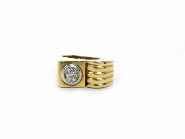 White and yellow gold ring with diamond