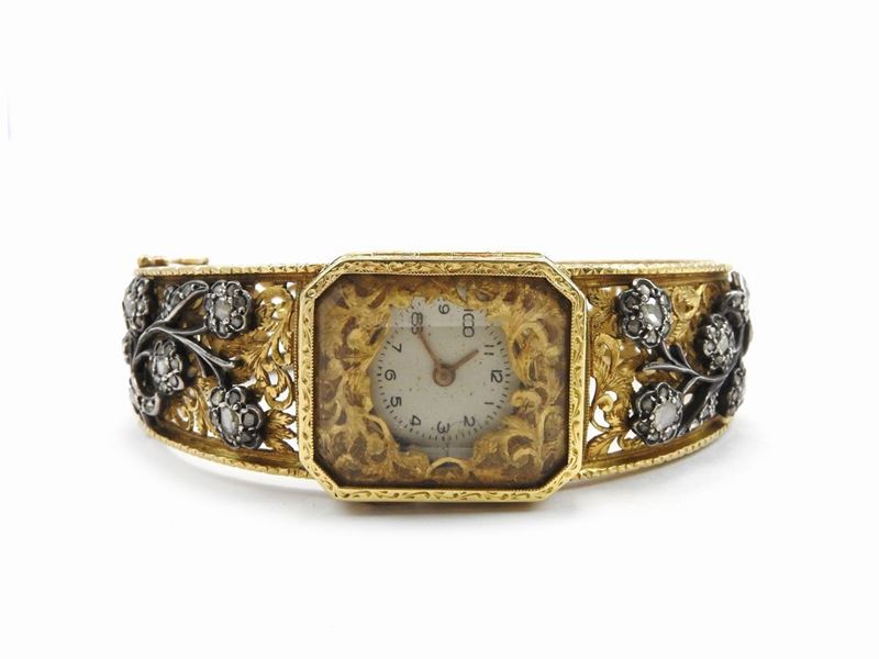 Bracciale Rigido Orologio in Oro Giallo e Argento con Diamanti