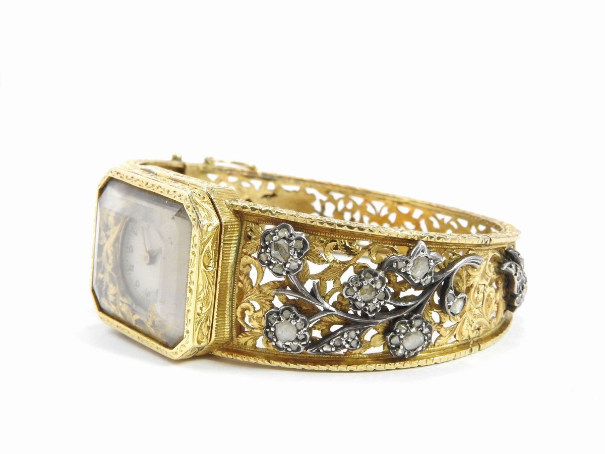 Bracciale Rigido Orologio in Oro Giallo e Argento con Diamanti