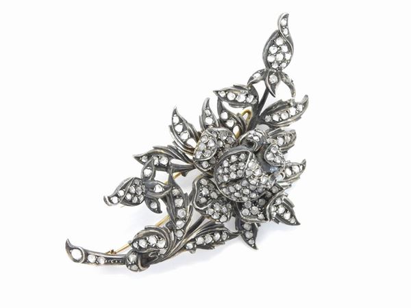Yellow gold and silver brooch with diamonds