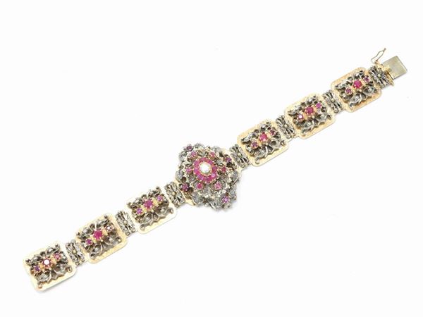 Pink gold and silver bracelet with diamonds and rubies