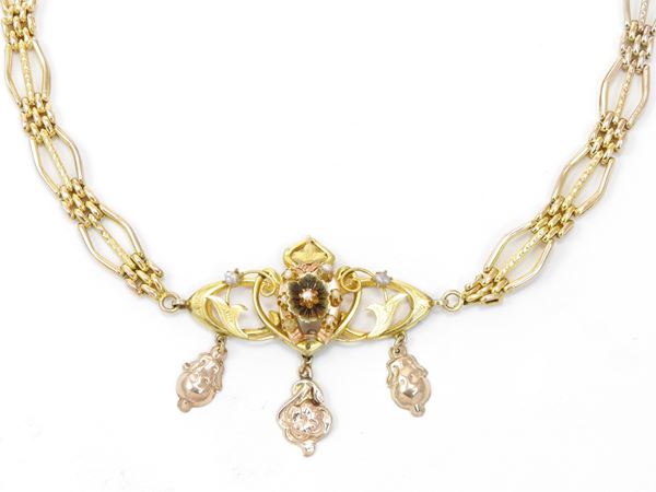 12Kt pink and yellow gold chocker with micro-pearls