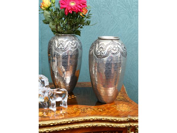 Pair of vases in silver-plated metal