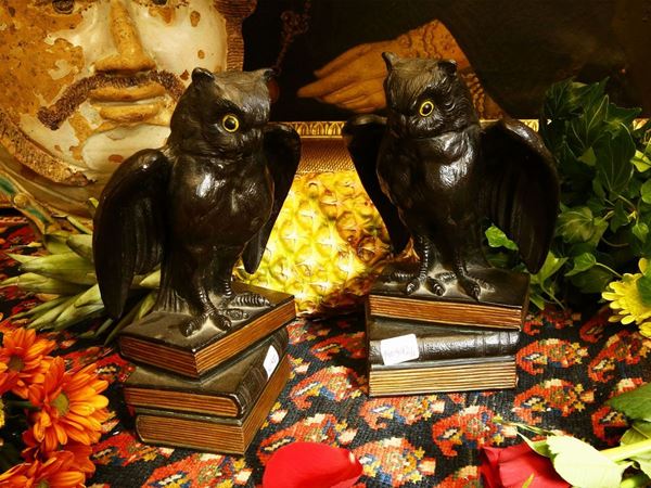 Pair of bookends in patinated metal