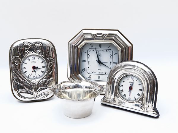 Four table clocks