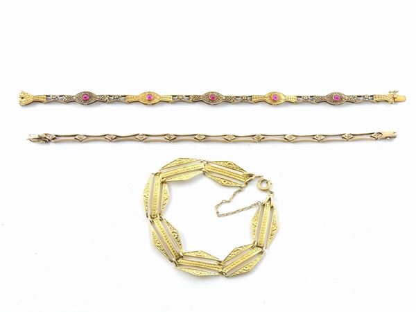 Various gold alloy and silver three bracelets with synthetic corundums