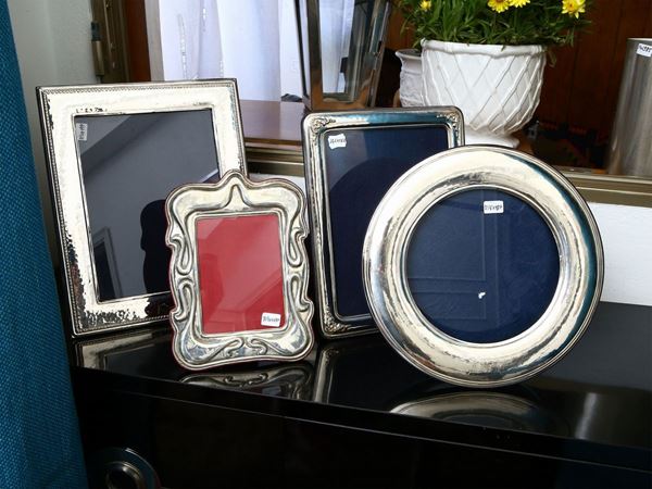 Quattro cornici portafoto in argento