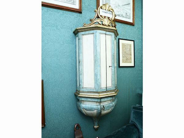 Hanging cabinet in lacquered wood in shades of light blue and ivory