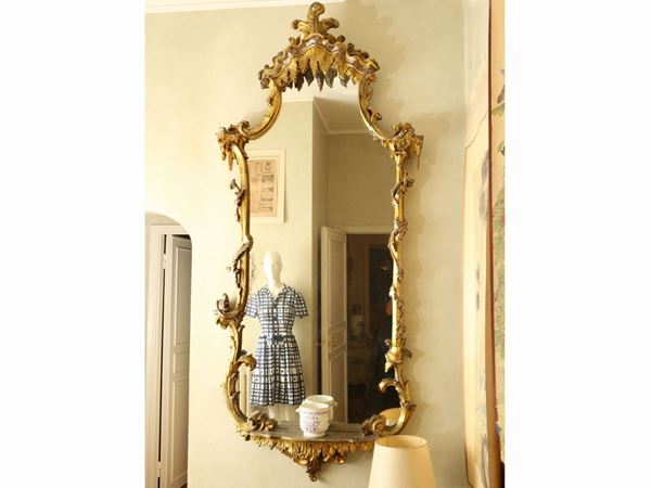 Large mirror in carved and gilded wood