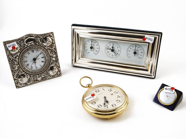 Four table clocks