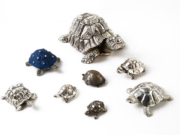 Collezione di tartarughe in argento e metallo argentato