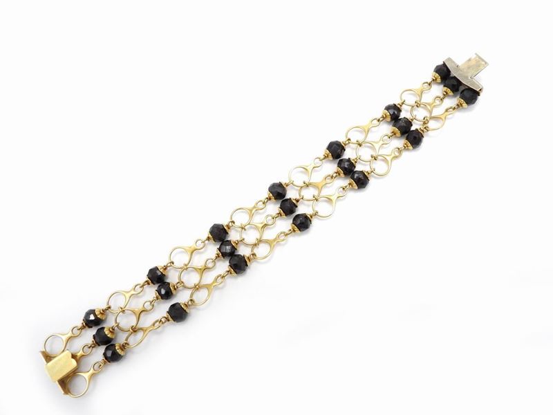 Bracciale in Oro Giallo con Granati