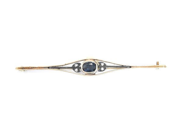 12Kt rose gold and silver bar brooch with diamonds and sapphire