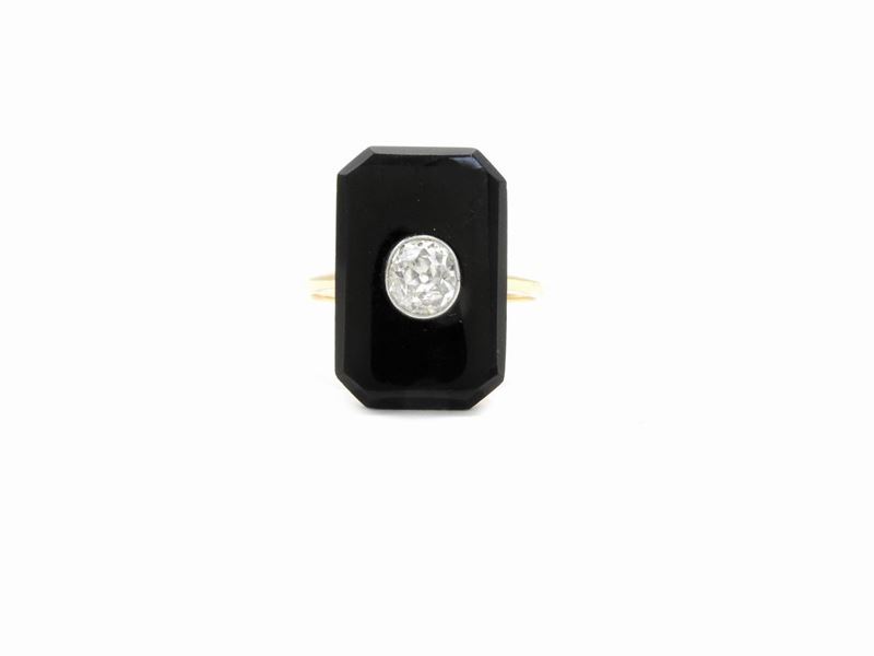 Anello in Oro Giallo con Diamante ed Onice