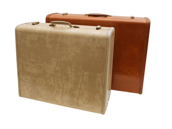 Two Samsonite suitcases in volcanic fiber