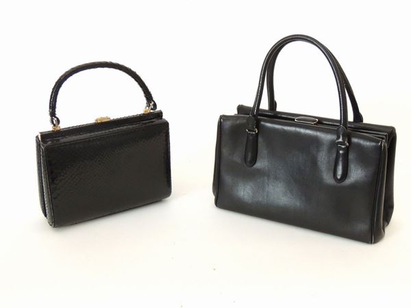 Two handbags in leather and black lizard