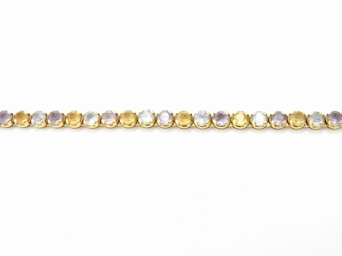 Bracciale in Oro Giallo con Topazi Azzurri, Quarzi Varietà Ametista e Quarzi Varietà Citrino
