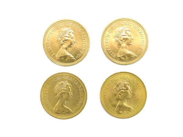 Quattro monete da una sterlina