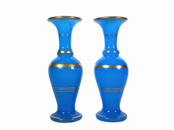 Pair of small vases in light blue opaline with gold highlights