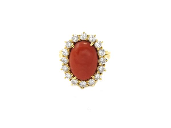 Yellow gold ring with diamonds and coral