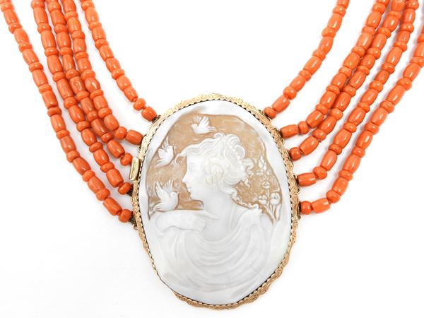 Multi-strand orange red coral necklace with 12Kt gold and shell cameo clasp
