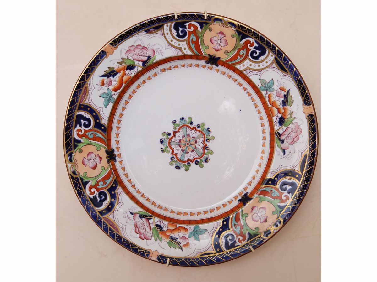 Quattro Piatti Decorativi in Porcellana