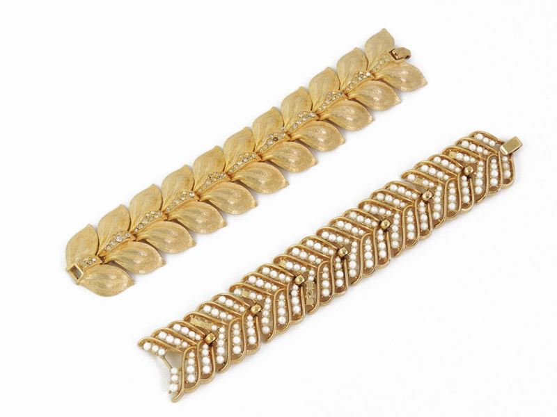Due Bracciali in Metallo Dorato, Trifari e Art