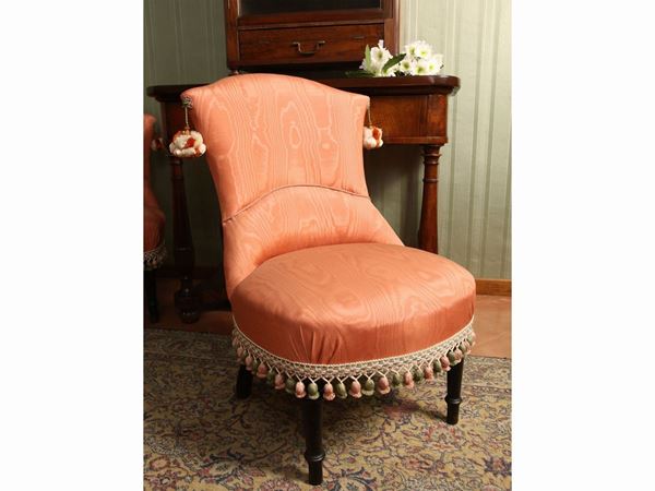 Pair of padded armchairs covered in salmon pink moirè fabric