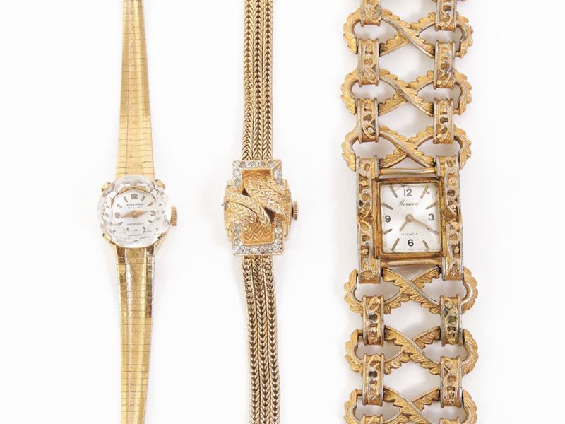 Tre Orologi in Metallo Dorato