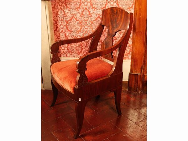 Pair of mahogany feather armchairs
