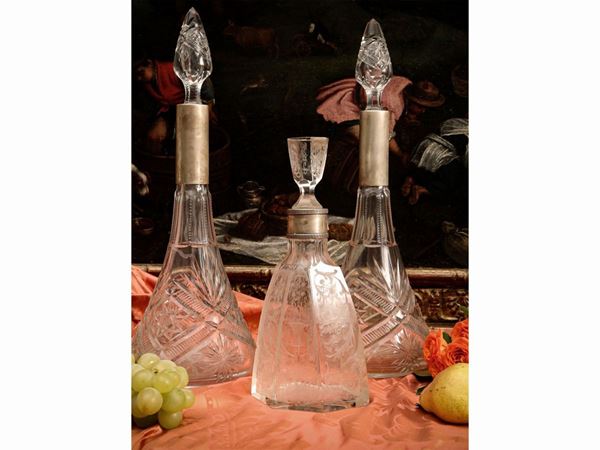 Pair of crystal bottles bound in silver