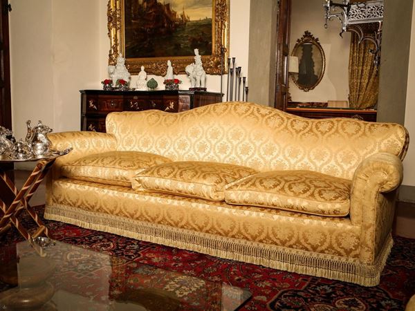 Upholstered three-seater sofa