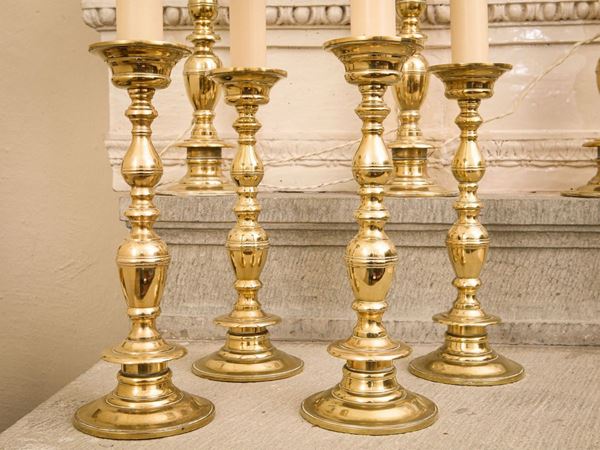 Set of four brass torches