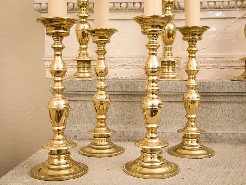 Serie di Quattro Torciere in Ottone