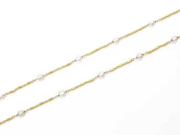Lunga collana Chimento in oro giallo con perle barocche coltivate