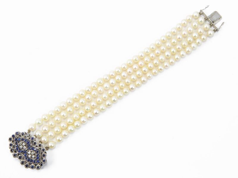 Bracciale Quattro Fili di Perle Coltivate con Fermezza in Oro Bianco Diamanti e Zaffiri