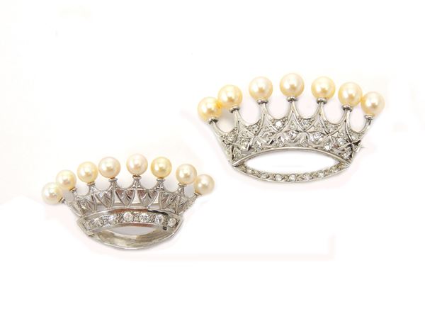 Two white gold, crown-shaped brooches with diamonds and Akoya pearls