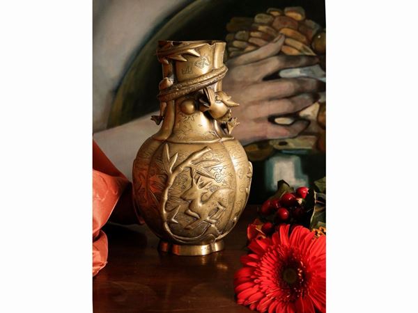 Oriental vase in golden metal