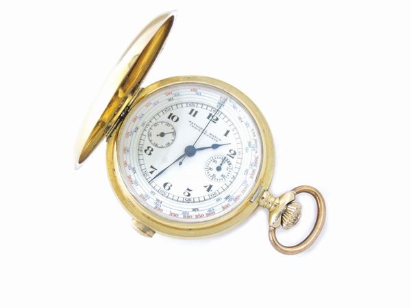 Cronografo monopulsante da tasca National Watch in oro giallo