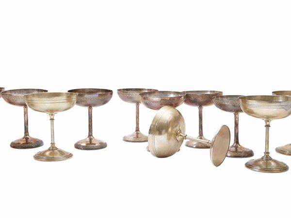 Set of fifteen champagne glasses in silver-plated metal