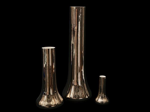 Three vases in silver ceramic
