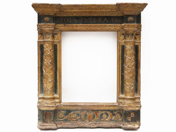 Aedicule mirror frame in ebonized wood and gold highlighting