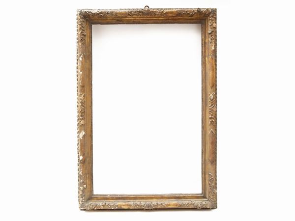 Carved and gilded wooden frame