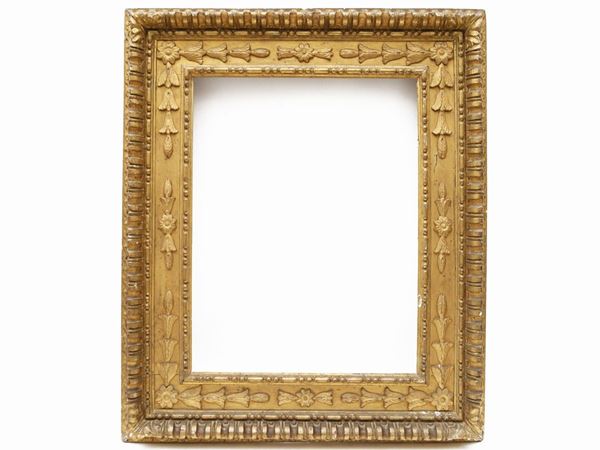 Box frame in carved and gilded wood