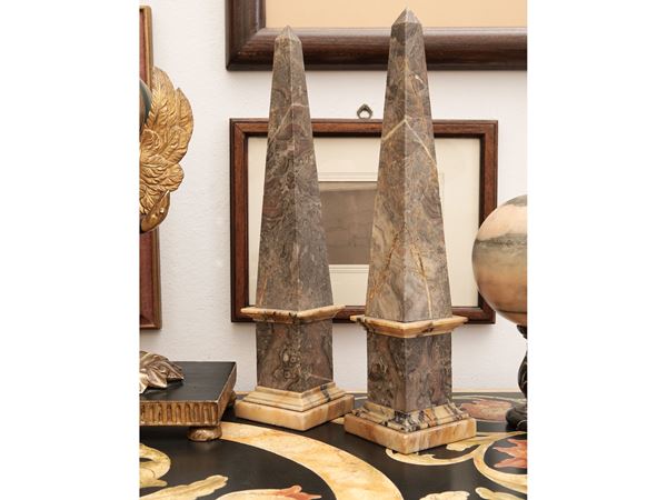 Pair of African marble obelisks