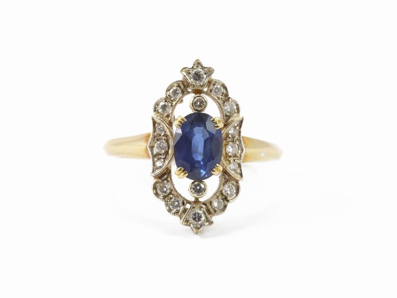 Anello in Oro Bianco e Giallo con Diamanti e Zaffiro