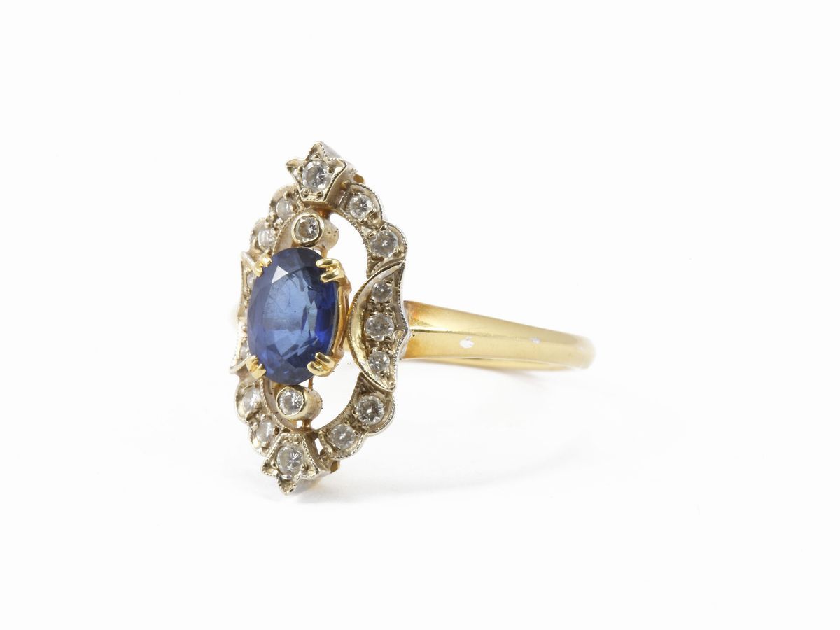 Anello in Oro Bianco e Giallo con Diamanti e Zaffiro