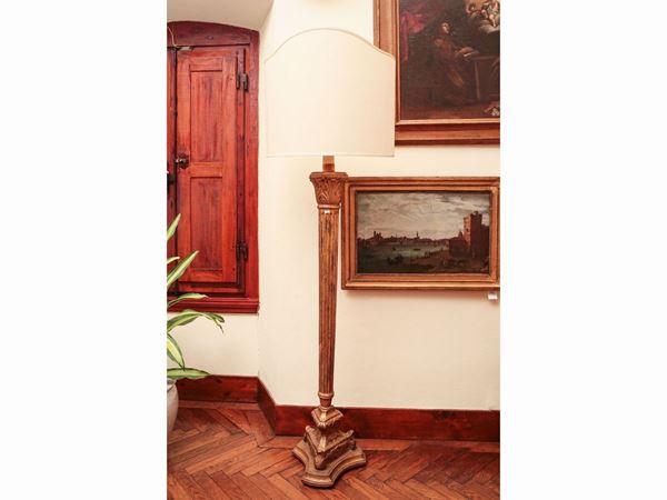 Floor lamp in carved and gilded wood