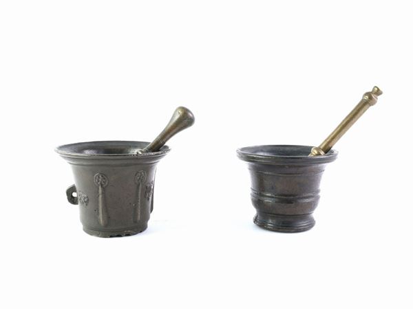 Two small bronze mortars with pestle